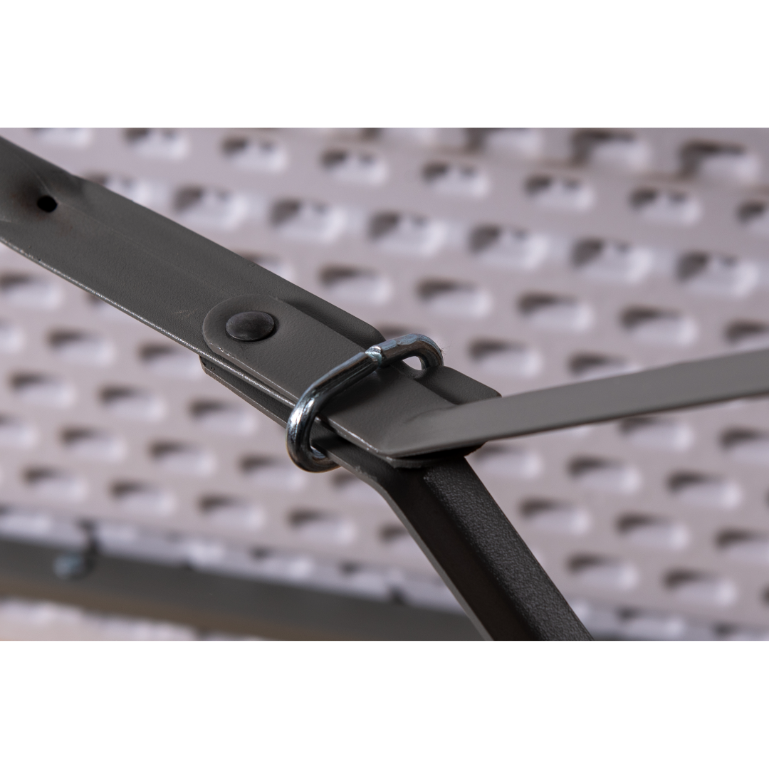 4ft solid polypropylene folding table with tubular steel legs and secure locking mechanism.