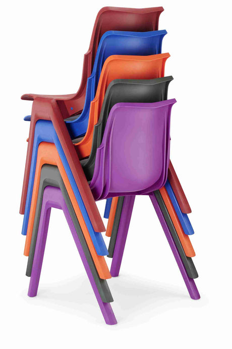 Stacked colorful Ergostak Chairs showcasing ergonomic design and durability.