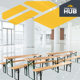 6ft folding festival benches in a modern indoor setting with white flooring and large windows.