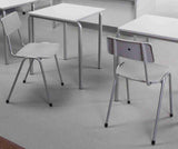 MX24 Polypropylene Chair in classroom setting with steel frame and stackable design.