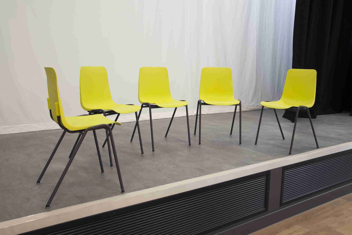 MX70 Reinspire Classic Chair with integrated back support and durable steel frame on stage.