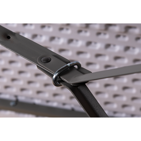 4ft solid polypropylene folding table with tubular steel legs and secure locking mechanism.